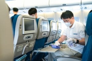 Korean Air CEO cleaning and disinfecting a plane.