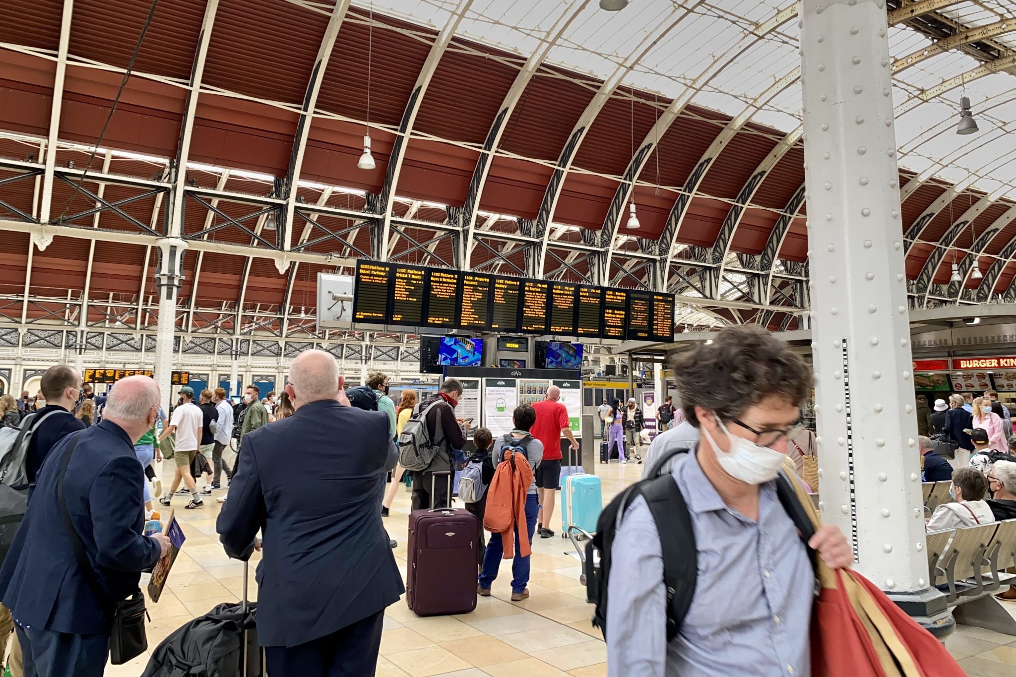 Travelers at London's Paddington Station. Many restrictions will need in England in late July, but quarantine for many international travelers will likely continue. 