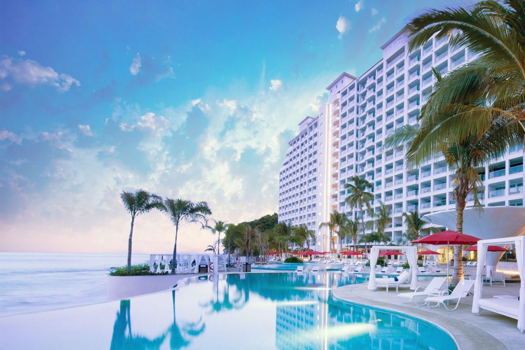 Hilton's push into all-inclusive resorts isn't just about leisure travel (pictured: the planned Hilton Vallarta Riviera All-Inclusive Resort). 