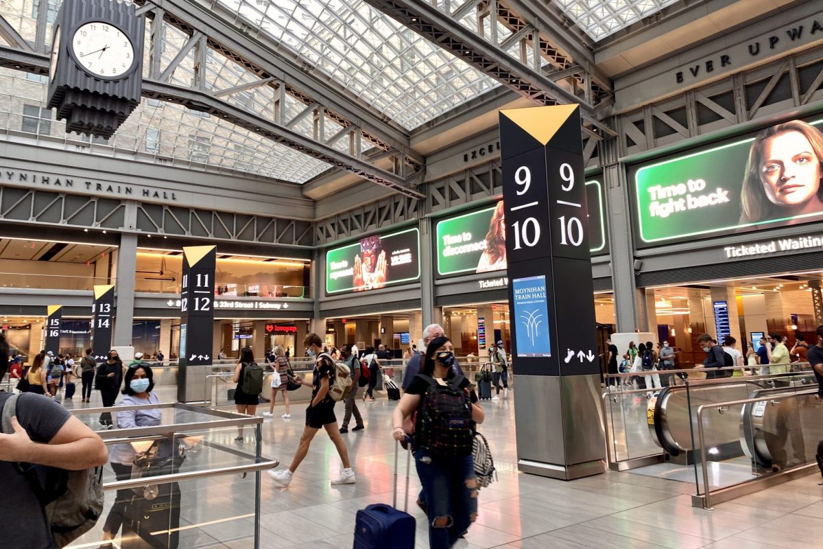 Interior of Penn Station's Moynihan Train Hall in New York City. Summer travel in 2022 will feel more like 2019 than the last two years. 