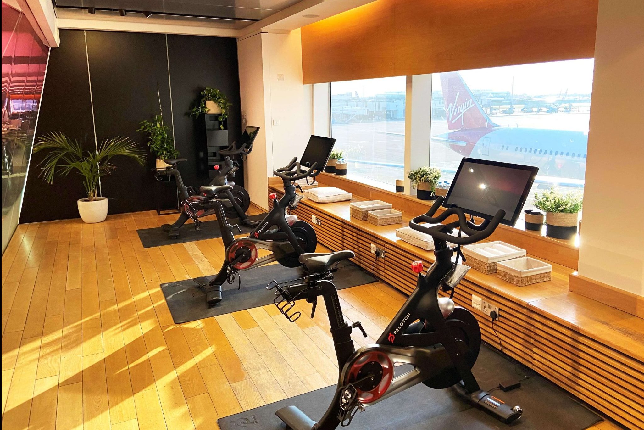 Virgin Atlantic's Clubhouse at London Heathrow offers the use of Peloton bikes.