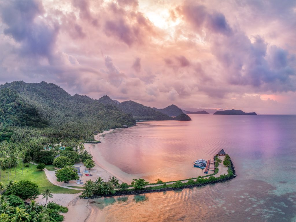 Aerial view of green hills and beach Fiji islands