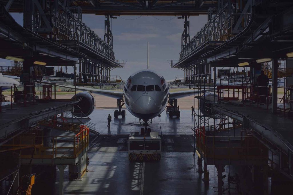 An airplane in an aircraft hangar. IAG, International Airlines Group, sped up its sartup accelerator in 2020. Hangar 51 accelerated 22 startups — its largest cohort yet.