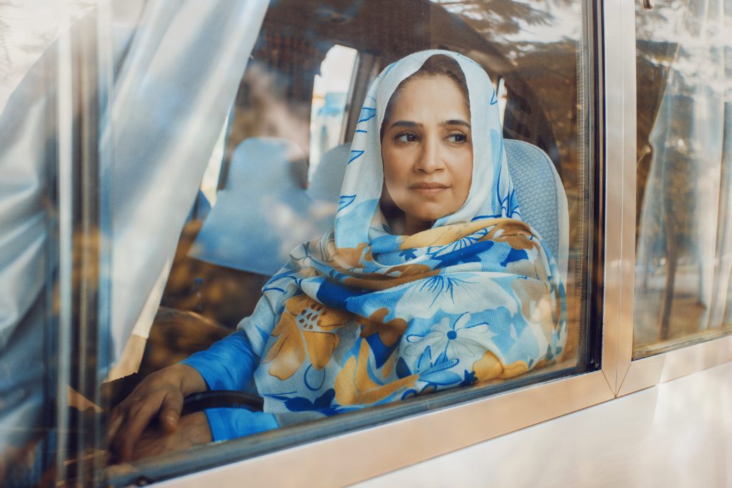 In an image from before the pandemic, a passenger rides in a Swvl vehicle on a route in a Middle Eastern country. Source: Swvl.