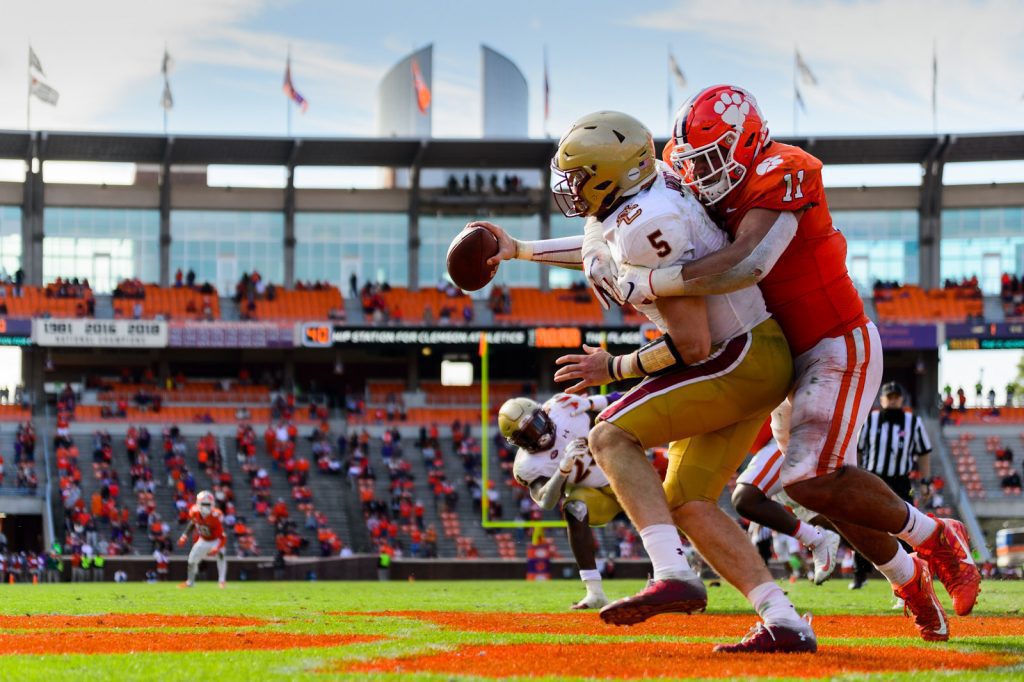 College football stars at institutions like Boston College (left) and Clemson (right) will surely look to take advantage of any NIL opportunities.