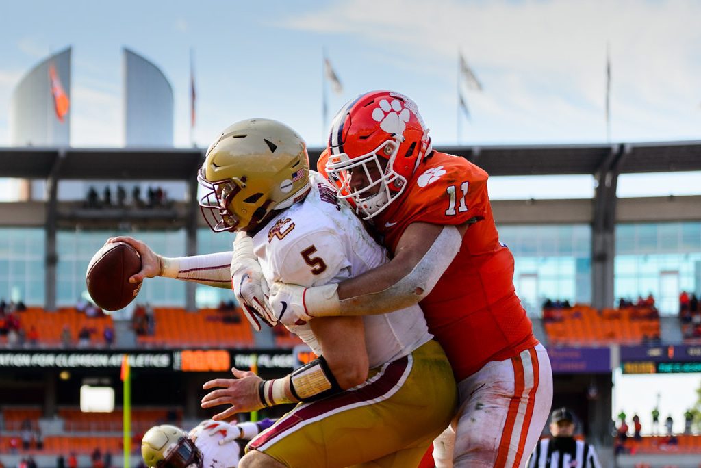 College football stars at institutions like Boston College (left) and Clemson (right) will surely look to take advantage of any NIL opportunities.
