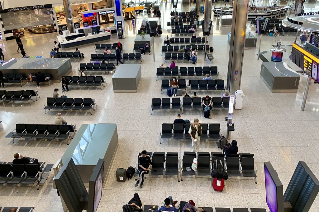Passengers seated at Heathrow's Terminal 2 in October, 2021. U.S. carriers have seen a surge in the bookings since the White House announced it would reopen transatlantic flights in November. 