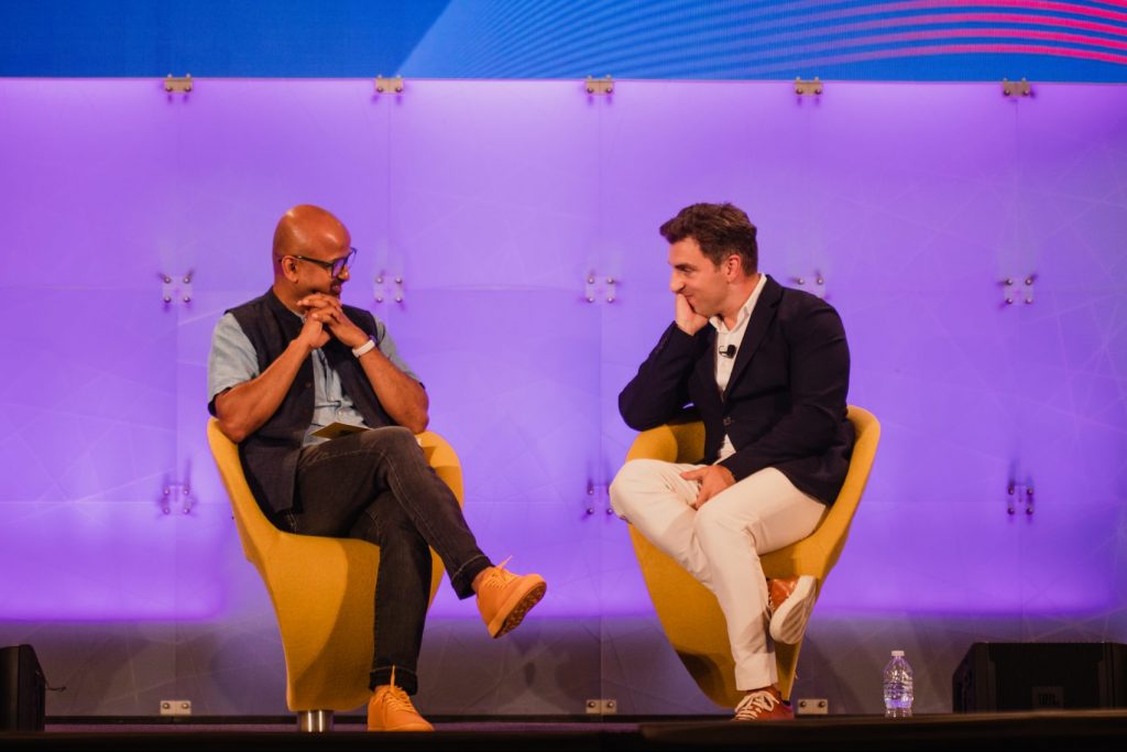 Rafat Ali on stage at Skift Global Forum in NYC, 2019.