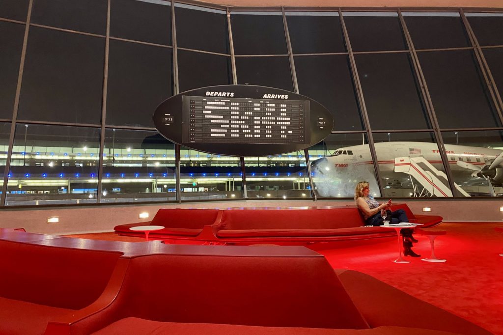 TWA Hotel lobby at night during Skift Global Forum