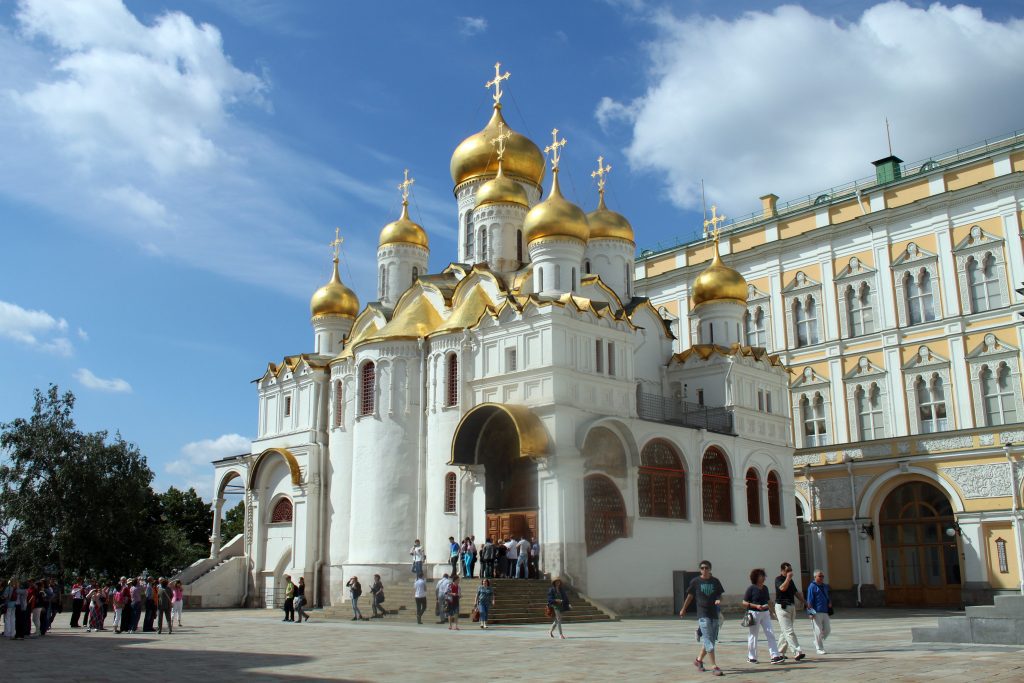 Visitors walking around the iconic Moscow Kremlin