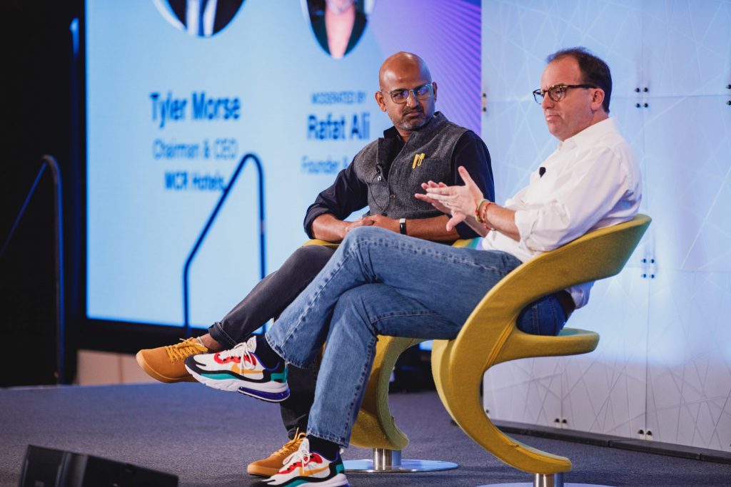MCR CEO Tyler Morse (right) on stage at Skift Global Forum 2021 at the TWA Hotel in New York with Skift founder and CEO Rafat Ali.