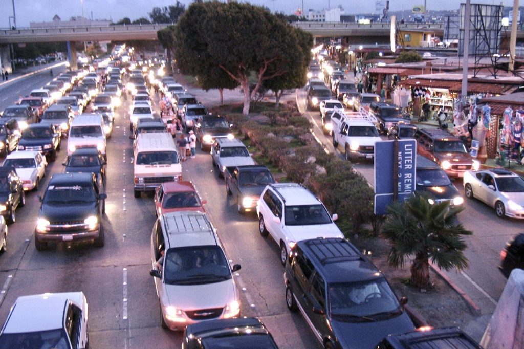 Cars line up in multiple lanes at the Tijuana border crossing between Mexico and the U.S. After 20 months of near closure, they will reopen to vaccinated travelers. 