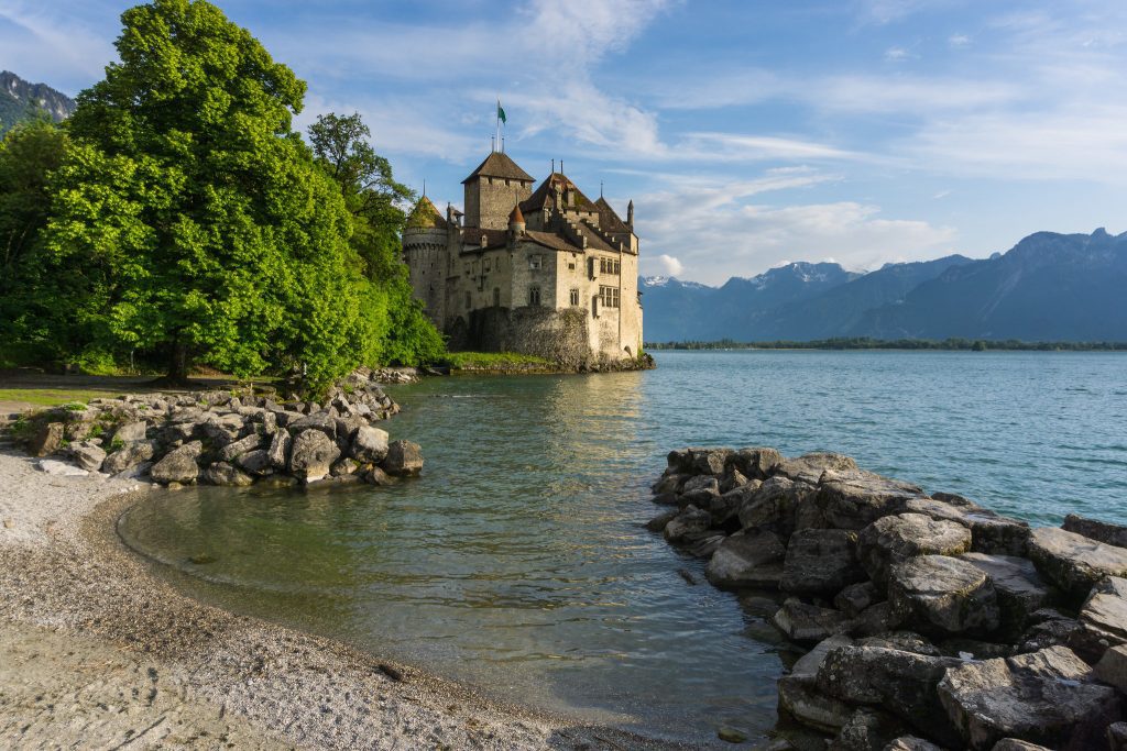 view of castle along lake Geneva Switzerland