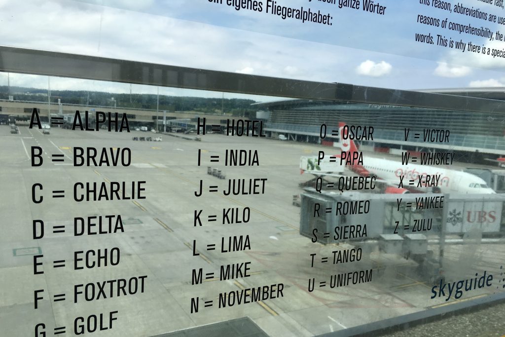 The phonetic alphabet on glass at an observation deck at Zurich's international airport.
