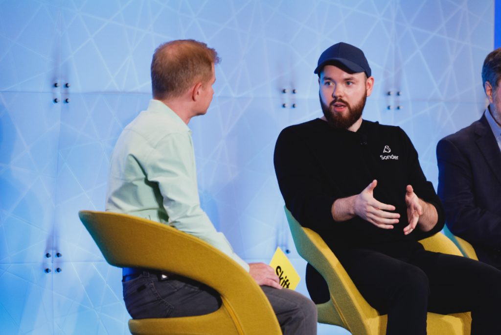 Sonder could start trading on Nasdaq January 14. Pictured, Sonder co-founder and CEO Francis Davidson (right) at Skift Global Forum 2021. 
