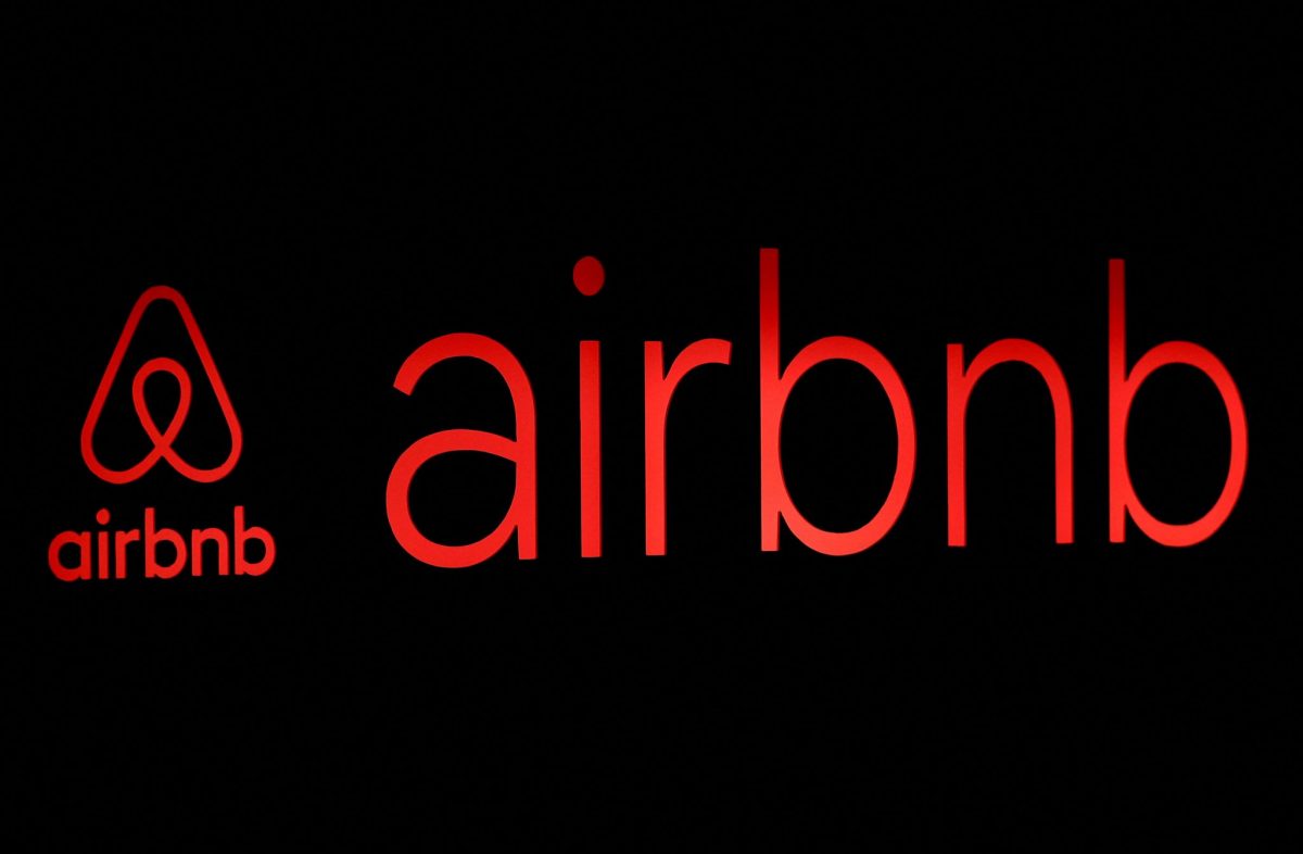 The logos of Airbnb are displayed at an Airbnb event in Tokyo, Japan, June 14, 2018. 