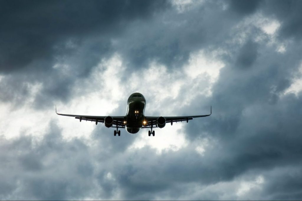 Plane in storm clouds