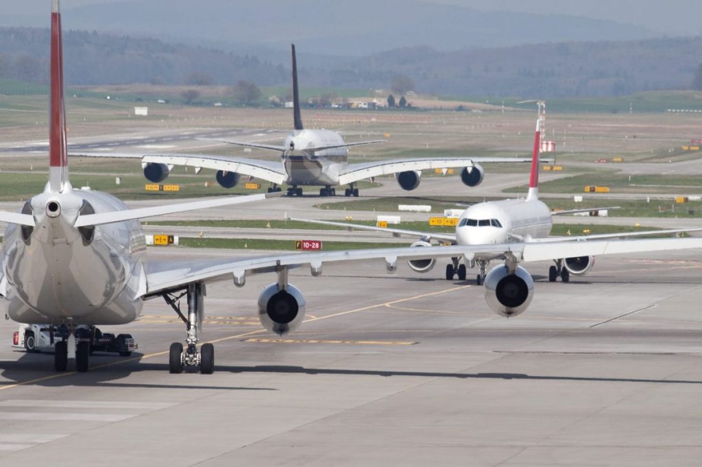 Crowded runway of jets
