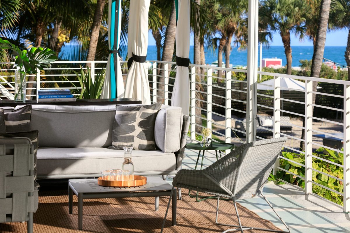 The Kimpton Surfcomber Hotel (pictured) encourages guests utilizing work-from-hotel amenities to do business from recently renovated cabanas and other areas conducive for social distancing.