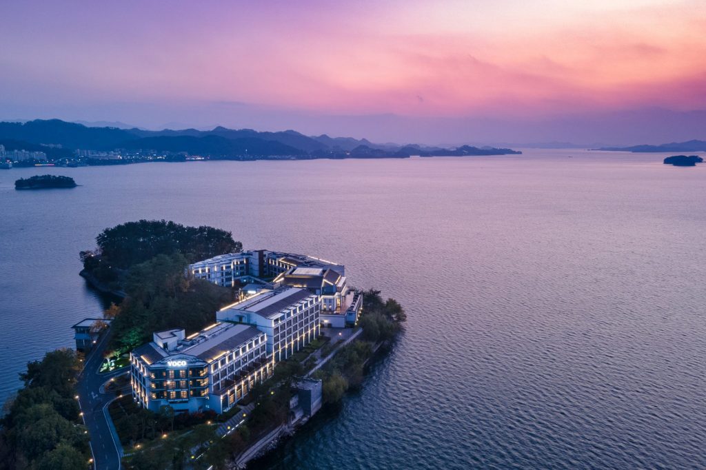 Newer brands like Voco (pictured: Voco Thousand Island Lake in China) are a rapidly increasing part of IHG's future expansion plans.