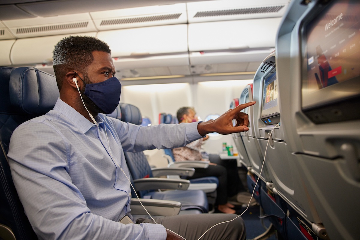 U.S. travelers will need to wear masks at least one more month as public health officials investigate easing rules.