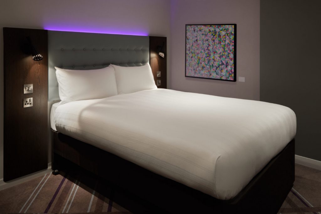 A Premier Plus guest room at a Premier Inn hotel owned by Whitbread. Source: Whitbread.