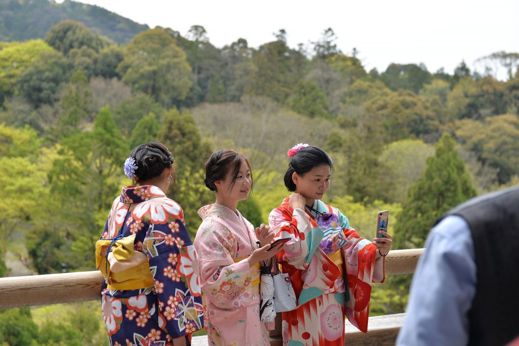 Chinese tourists at the Kiyomizu-dera temple in Kyoto, Japan.