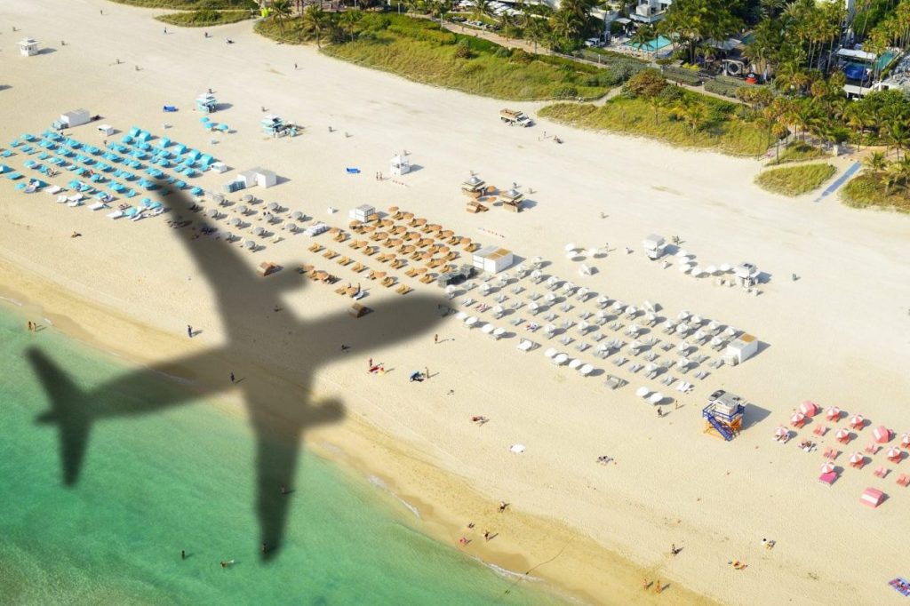 Jet plane shadow over South Beach in Miami.