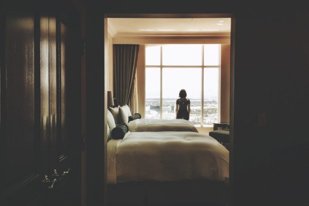 Lone guest in her hotel room