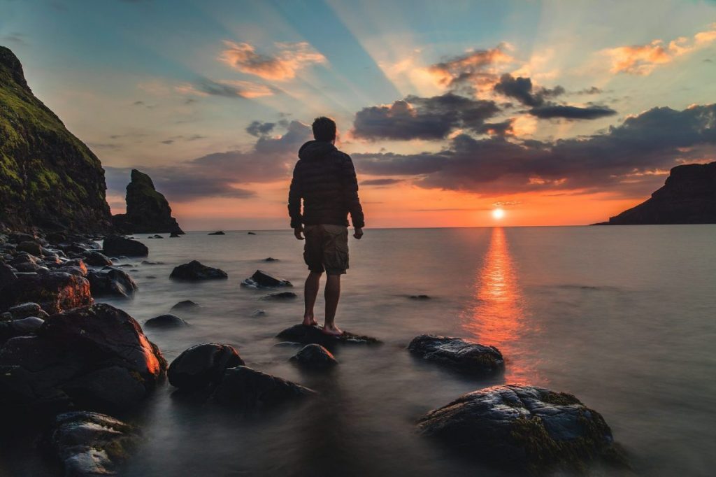 Guy staring at sunset