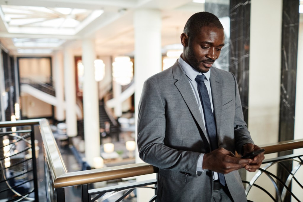 black hotelier African-American Businessman at Balcony