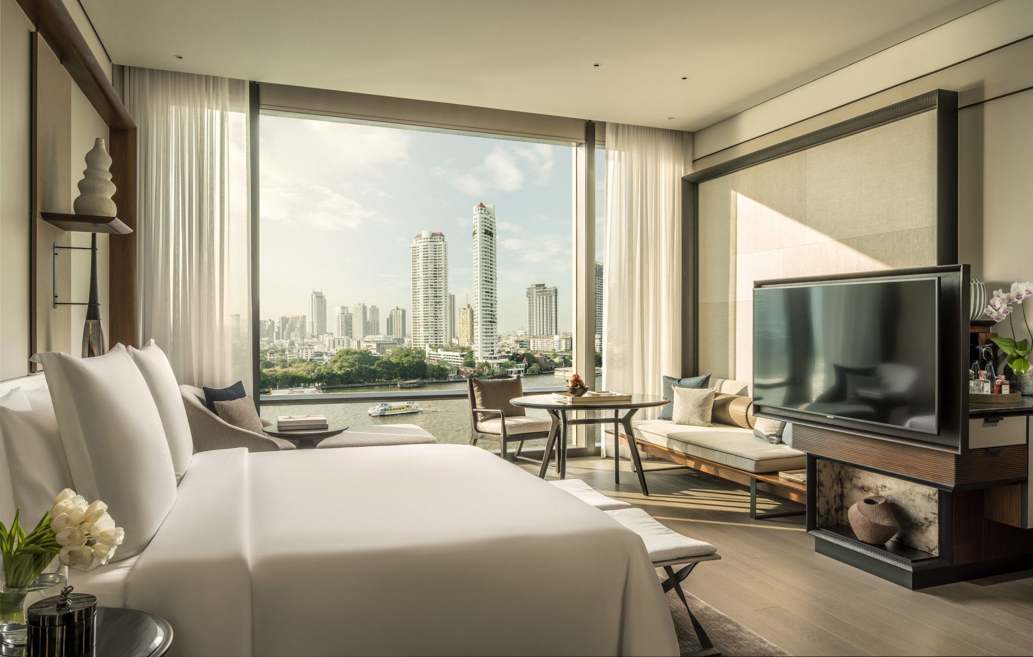 A view from a room in the Four Seasons Bangkok, a project of Denniston — an elite hotel designer. 