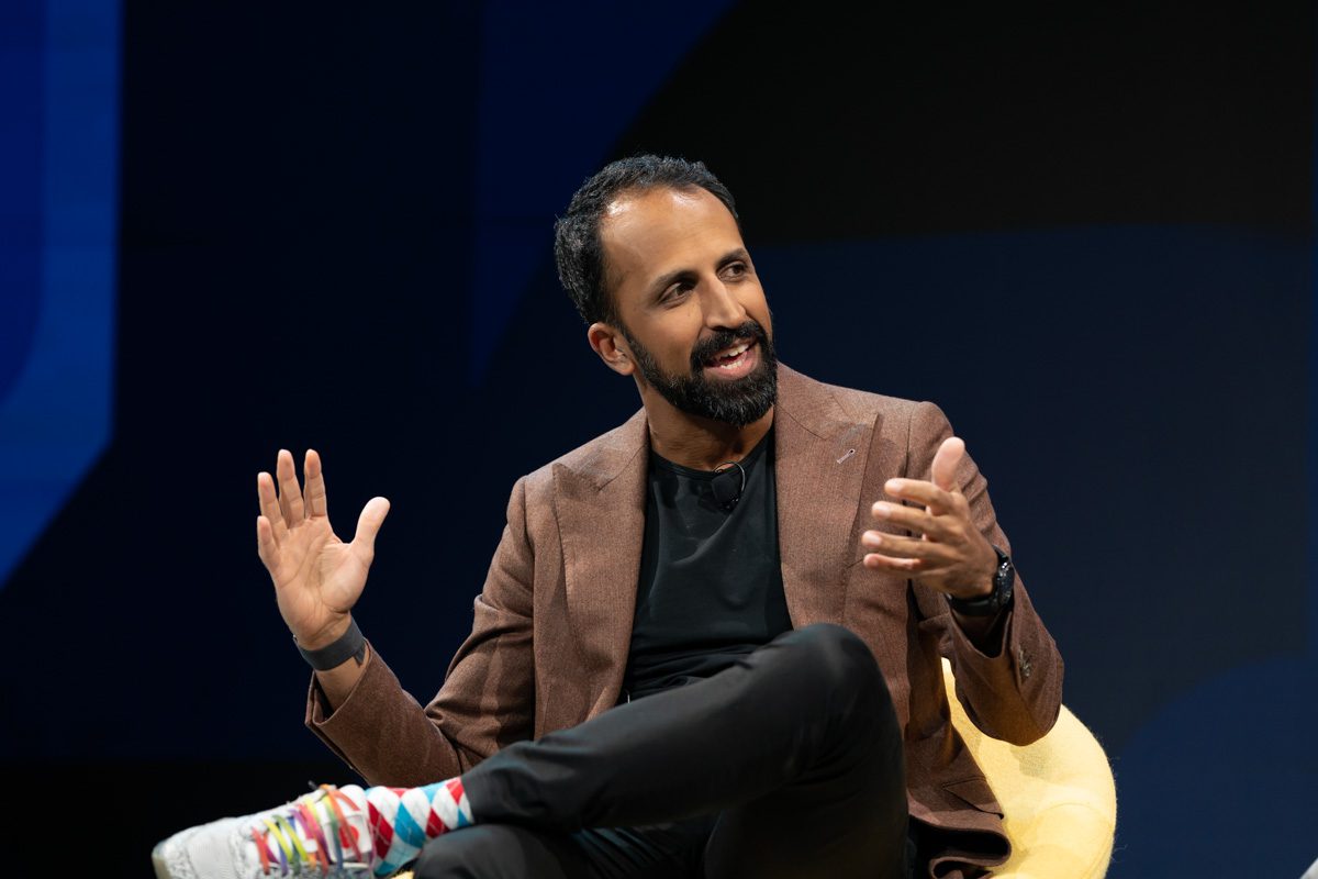 American Chief Commercial Officer Vasu Raja speaks on stage at the Skift Global Forum, on September 21 in New York City.