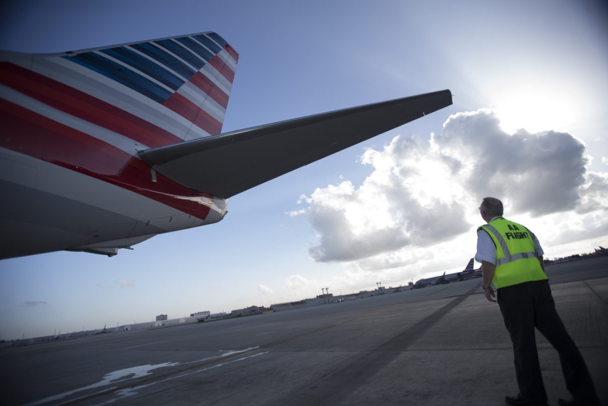 A pilot walks around an American Airlines plane for an inspection. Source: American Airlines.