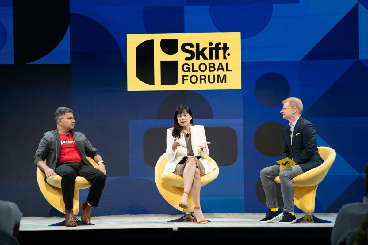 Shirley Lesmana, chief marketing officer at Traveloka and Amit Saberwal, CEO of RedDoorz, with Skift's Sean O'Neill at Skift Global Forum.