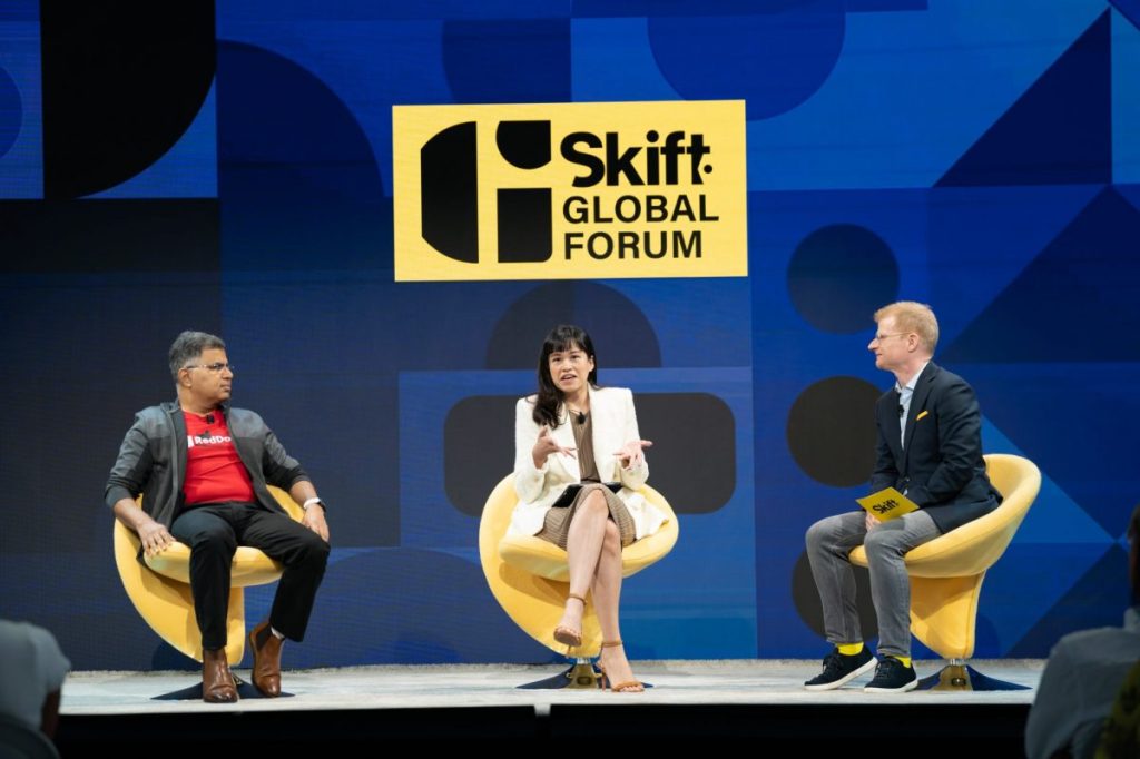 Shirley Lesmana, chief marketing officer at Traveloka and Amit Saberwal, the CEO of RedDoorz, with Skift's Sean O'Neill at Skift Global Forum