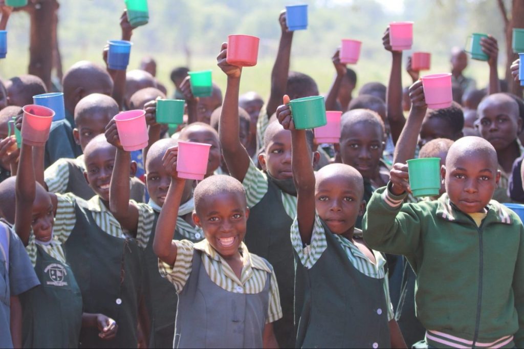 Children in Zimbabwe benefitting from a food progam.