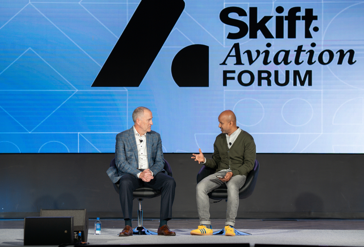 DFW Airport CEO Sean Donohue in discussion with Skift CEO and founder Rafat Ali at Skift Aviation Forum in November 2022.