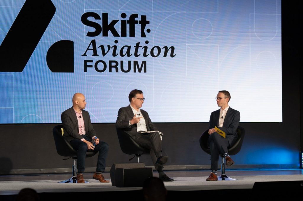Lukas Johnson (left), chief operating officer at Breeze Airways, and John Thomas, CEO of Connect Air, in discussion with Airline Weekly Editor Ned Russell at Skift Aviation Forum in Dallas
