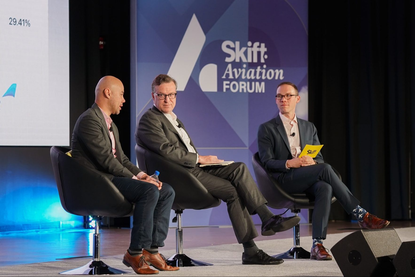 Lukas Johnson (left) of Breeze Airways and John Thomas of Connect Airlines speaking on stage at Skift Aviation Forum in Dallas, Texas, November 2022