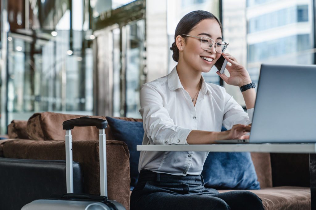 businesswoman working at airport