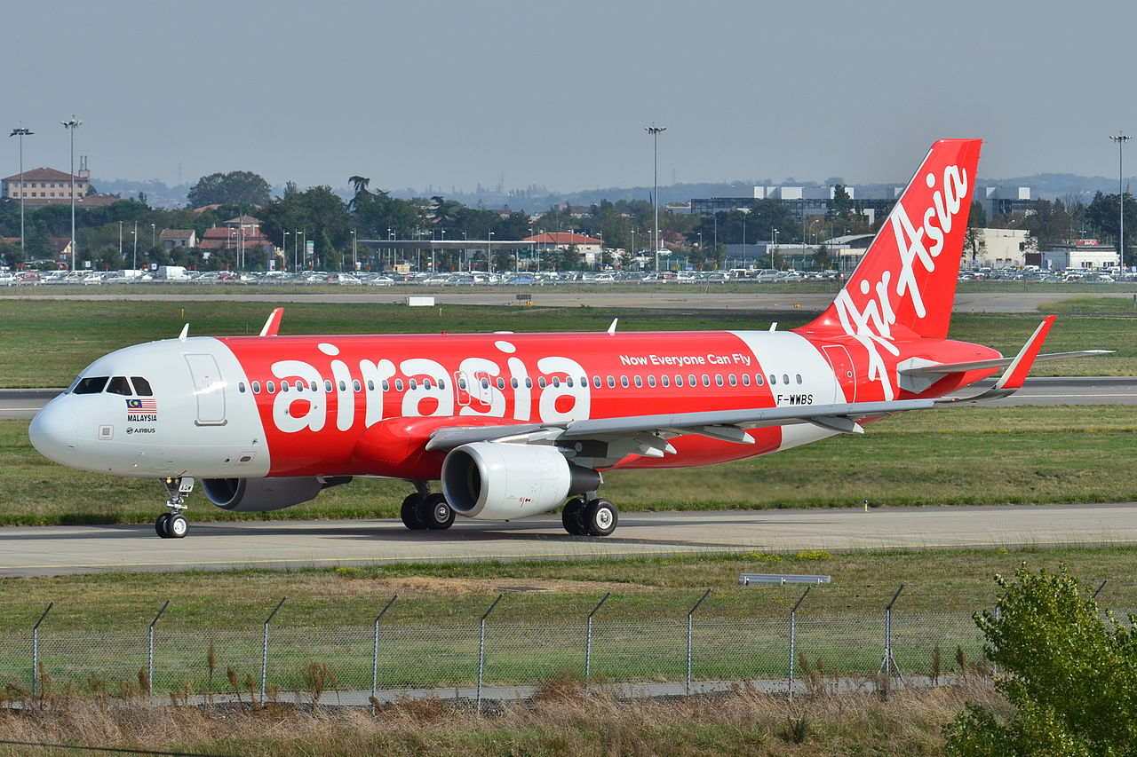 AirAsia's parent company still hasn't returned to profitability yet, but is upbeat about trends.