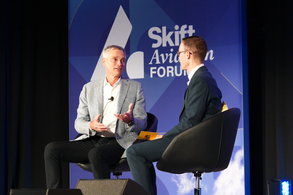 American Airlines CEO Robert Isom speaking on stage at Skift Aviation Forum in Dallas, TX, November 2022.
