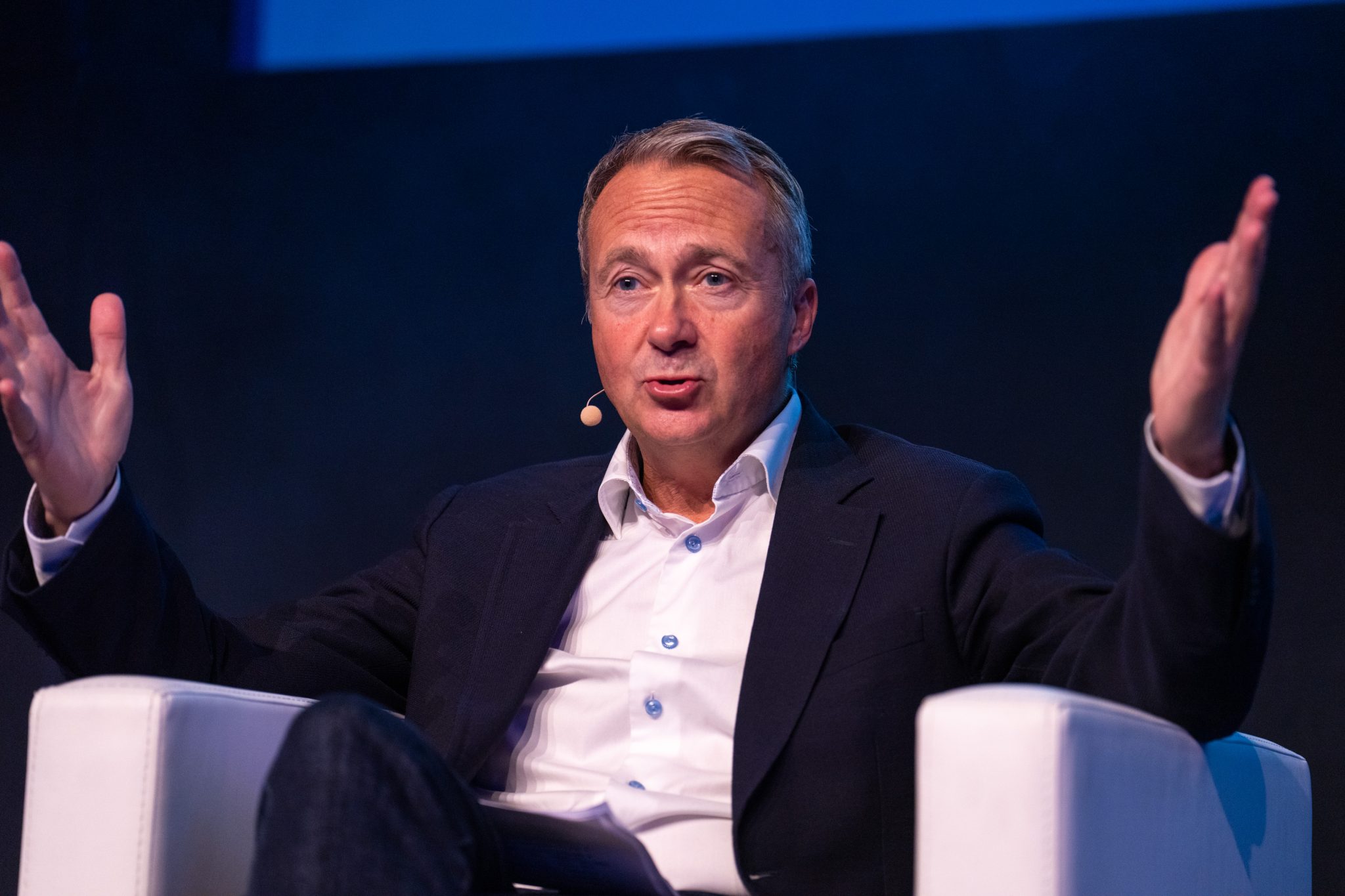 Paul Abbott, CEO of American Express Global Business Travel, speaking at the Global Business Travel Association’s inaugural Sustainability Summit, held in Brussels on Nov. 8, 2022