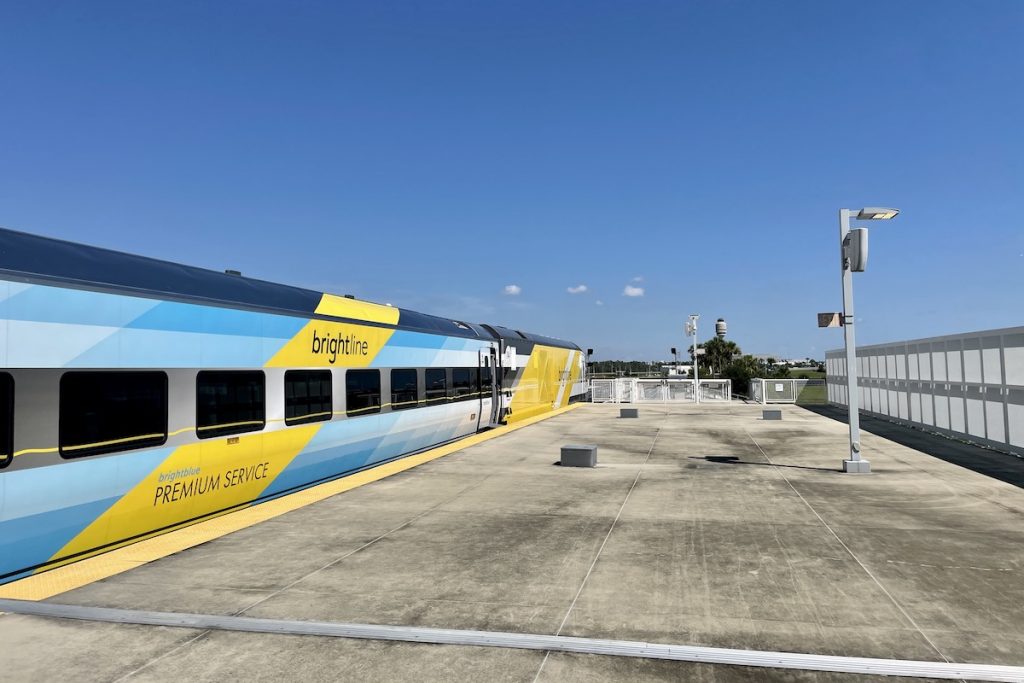 A Brightline train at the future Orlando airport station