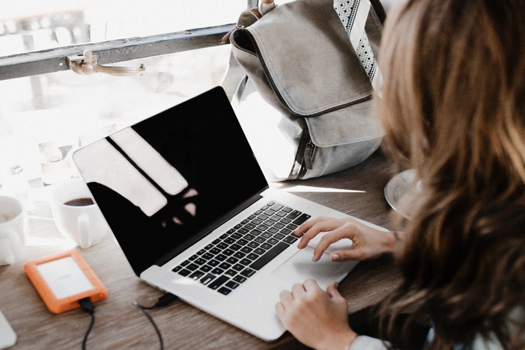 Woman working with laptop.