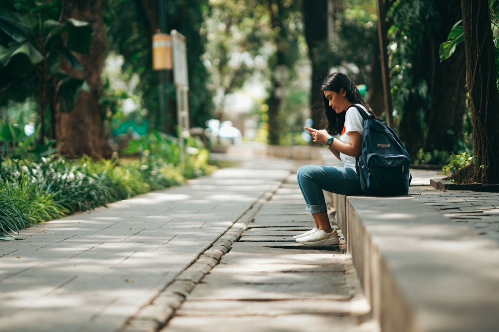 Tourist on mobile phone.