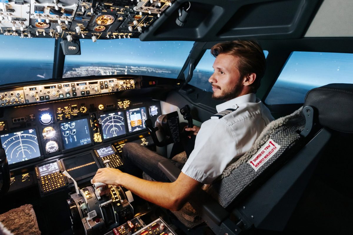 A pilot in the cockpit. Source: Maksim Denisenko / Adobe
