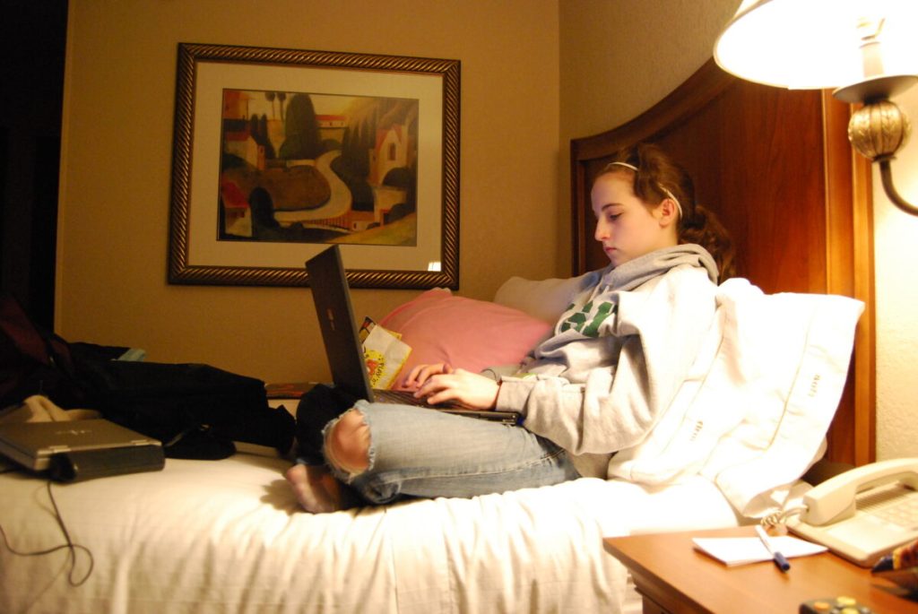 Hotel guest on computer