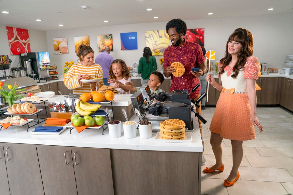 Zooey Deschanel and a family